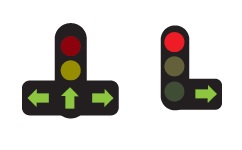 Luz roja y flecha verde del semáforo